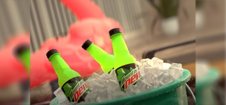 Bottles of Mountain Dew on a Bucket Full of Ice