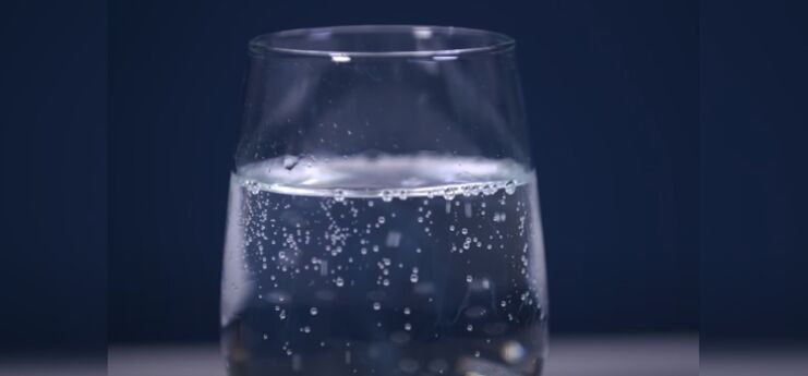 close up shot of club soda on a glass