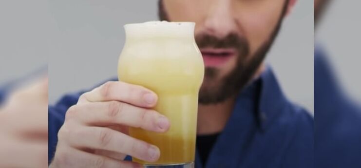 Man Holding Glass of Beer